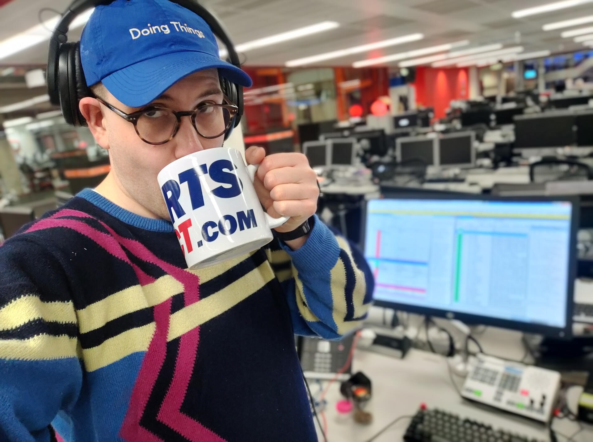 It's a picture of John at work in New Broadcasting House. It's a giant Sports Direct mug, which is sort of a thing in England...